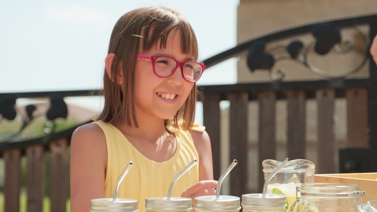 Little Girl Selling Lemonade Outside
