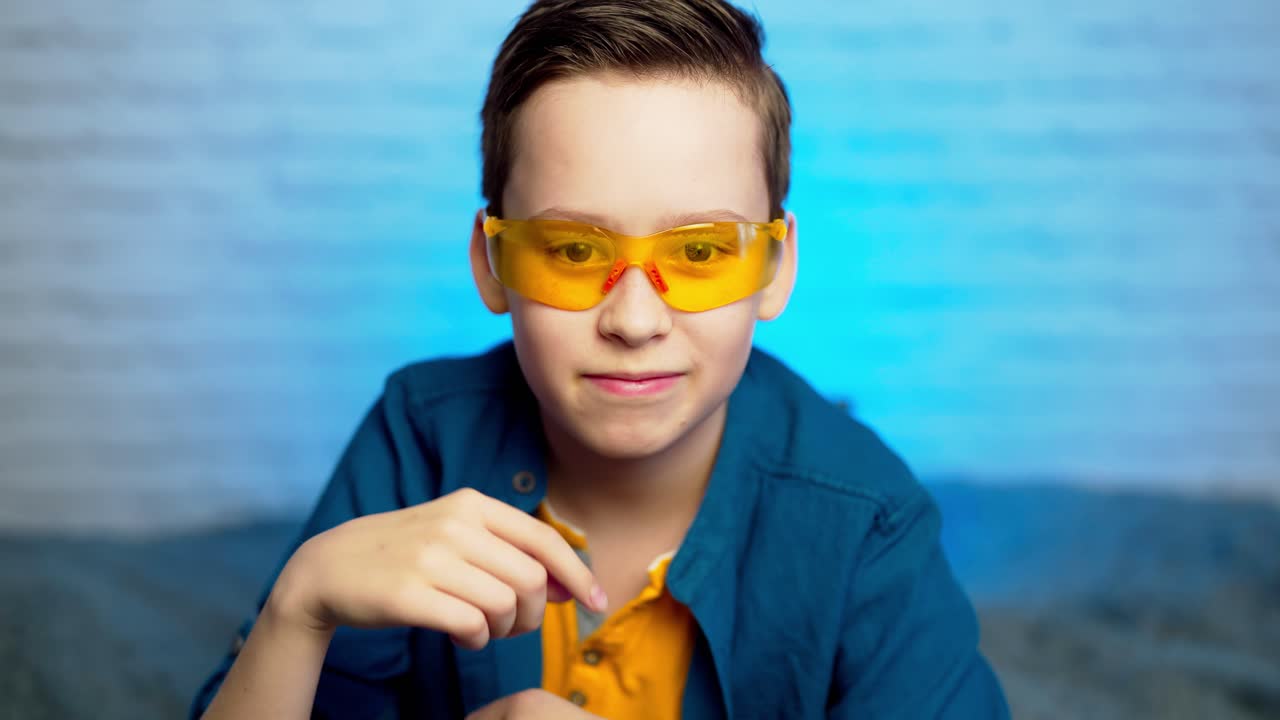 young boy as doctor wearing protective glasses