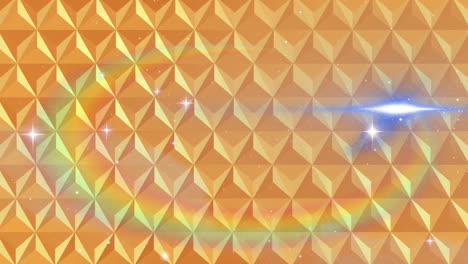 digital animation of abstract 3d shapes on yellow background against shining stars in space