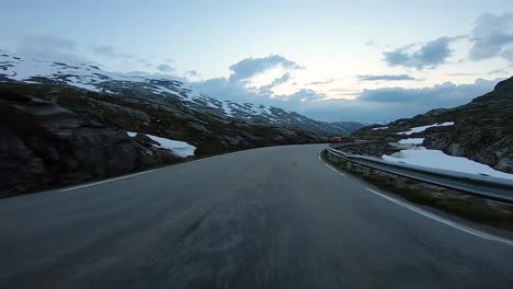 A-scenic-drive-through-the-Norwegian-countryside-following-another-vehicle