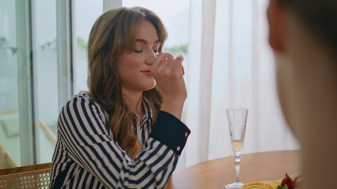 Girls friends sharing news at friendly gathering home closeup. Woman smiling