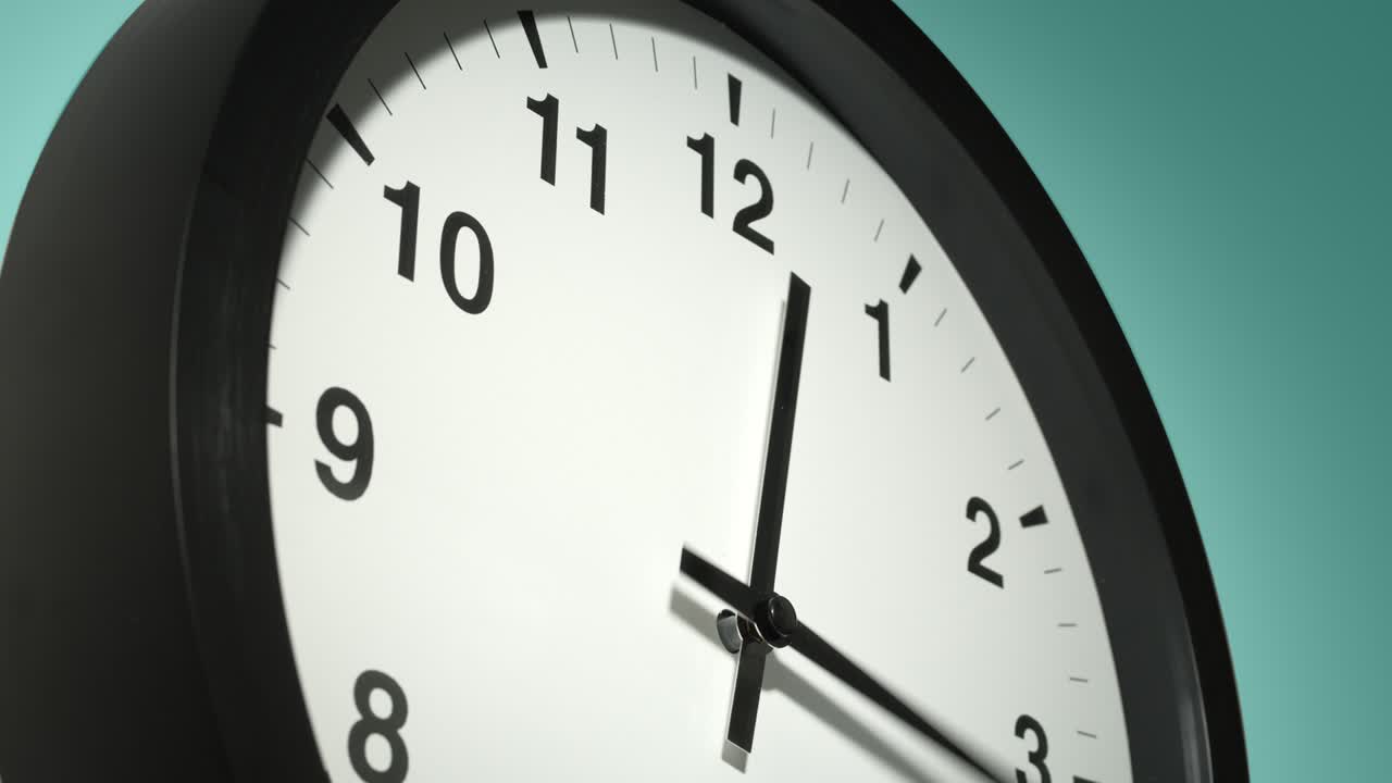 Clock Face on Cyan Blue Aquamarine Celadon Sea-Green Wall in Time Lapse