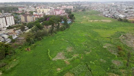 real estate of houses settlement in slums of kibera, drone descending from the slums of kibera kenya, houses construction in nairobi kenya