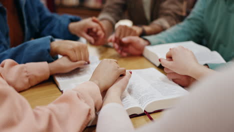 people praying together in a circle