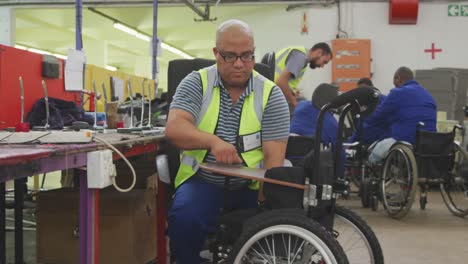 Disabled-man-installing-his-wheelchair