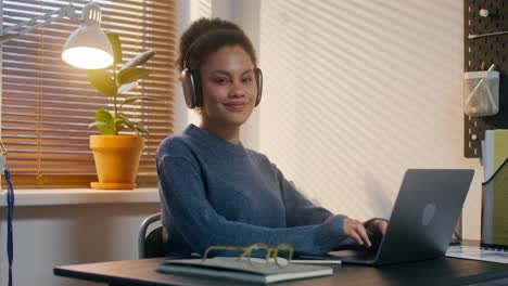 woman working on laptop at home