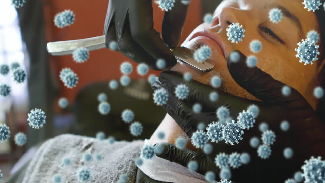 코로나19 세포는 이발사에 의해 면도되는 남자에 대항합니다.