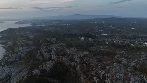 Aerial-view-at-dawn-of-Viksøy-Island-off-the-coast-of-Sotra,-Bergen,-Norway