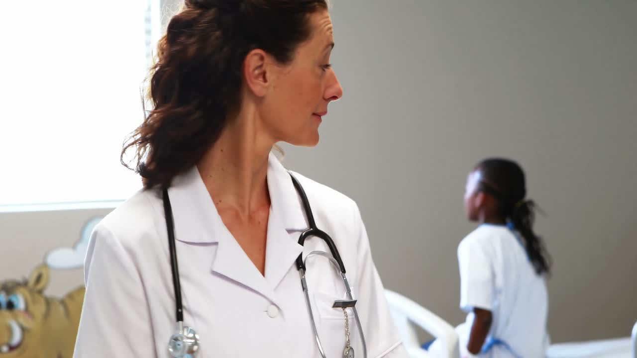 Female doctor writing a report
