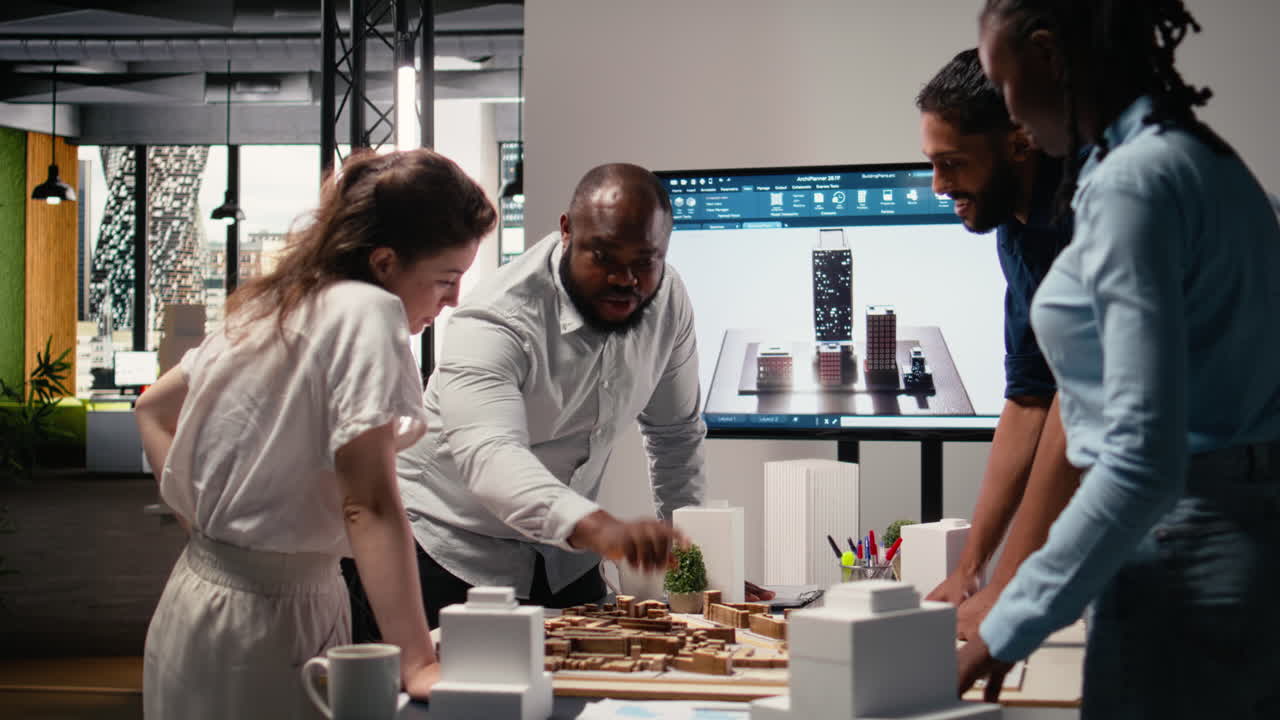 Close up of real estate engineers planning residential project layout