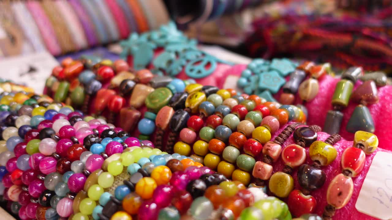 Colorful Beaded Bracelets at a Market Stall