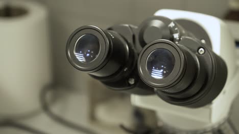 binocular professional scientific microscope laboratory, close-up