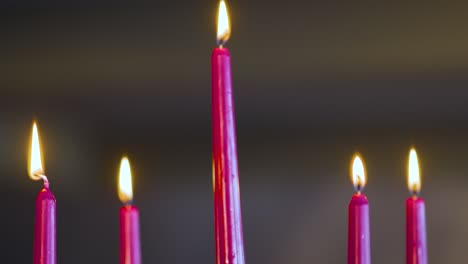 camera tilt red candle being lit