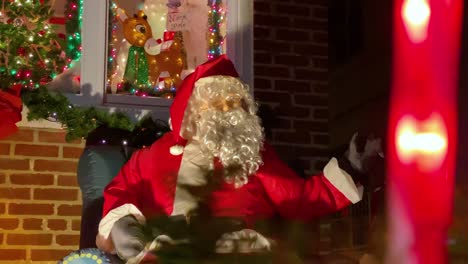 a figure of santa decorating a porch during the christmas season