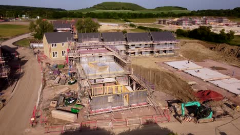 Close-up-drone-shot-scaffolding-and-equipment-on-construction-site