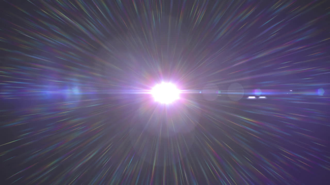 검은 바탕에 있는 빛의 반점과 흔적의 애니메이션