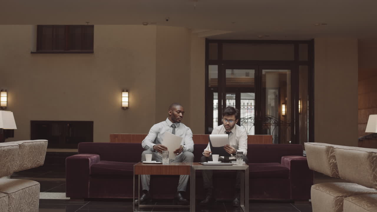 Manager Bringing Documents for Approval