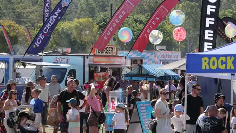 diverse group of people at a lively outdoor event