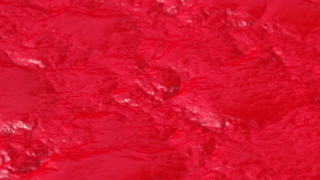 granulated lumpy red liquid background