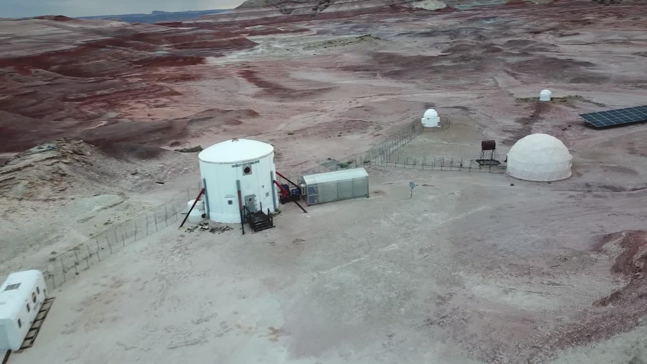 Dynamic Aerial View of Mars Desert Reseach Station in Relief of Utah Desert and Sandstone Hills, Hanksville USA