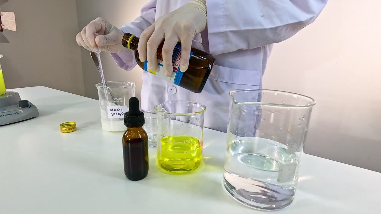 Scientist performs iodine clock reaction in a lab setting with precise chemical mixing and observation