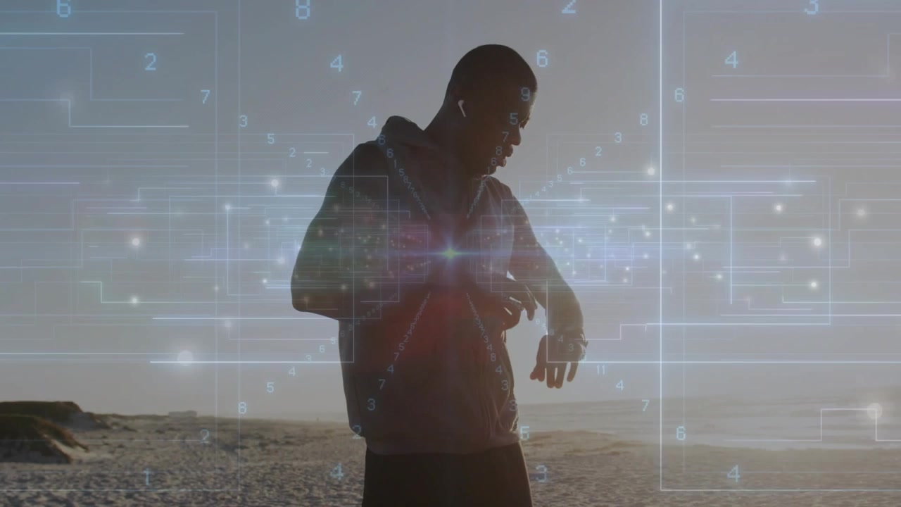 Man adjusting wireless earbud then checking smartwatch data with tech overlay drifting over beach