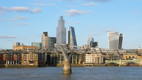 london cityscape with footbridge and modern architecture buildings