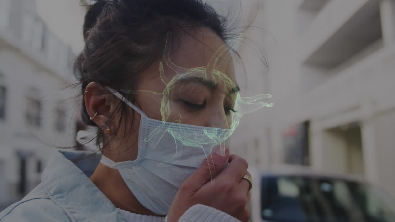 Animation of covid 19 cells moving over woman in face mask
