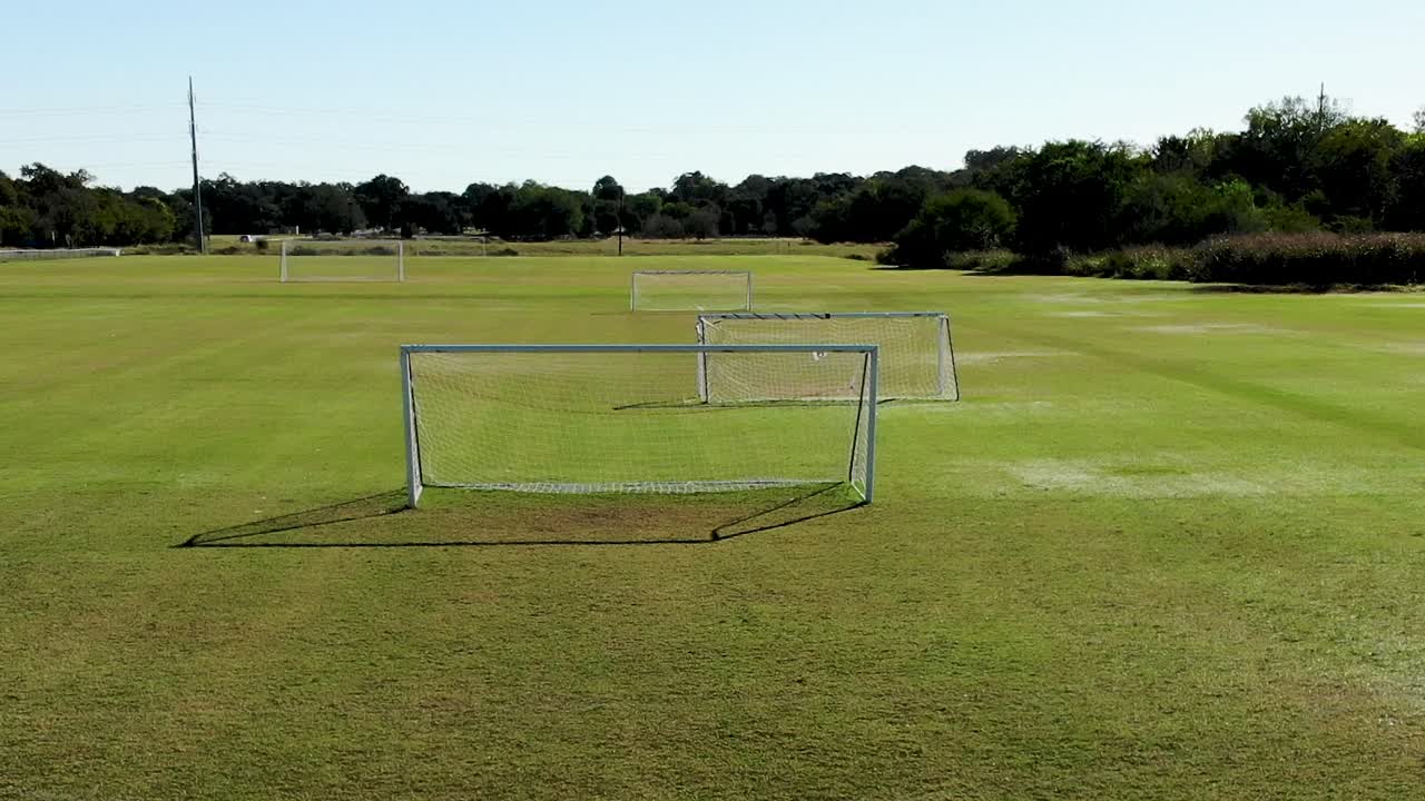 Reveal aerial view of a empty soccer field