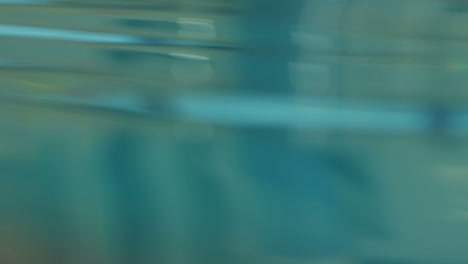 blue water surface in a swimming pool. wave background blue