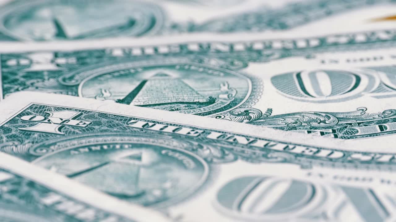 All seeing eye on the one dollar. The reverse side of the dollar denominations of 1 dollar rotate