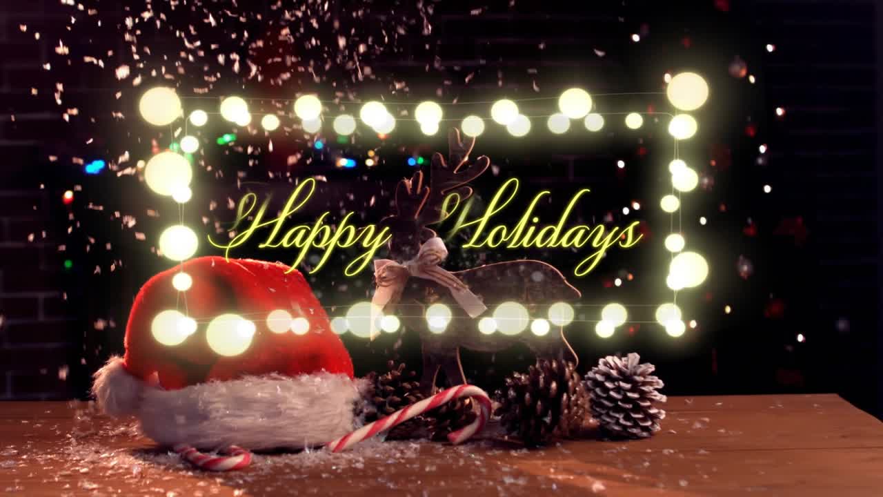 Holiday display showing text shifting into Happy Holidays causing confetti falling marking cheer