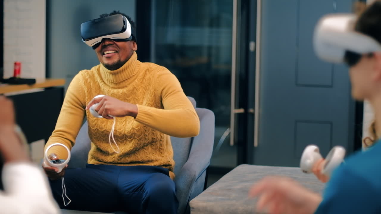 Business conference in VR in an office. Multiracial group of people using VR glasses and controllers