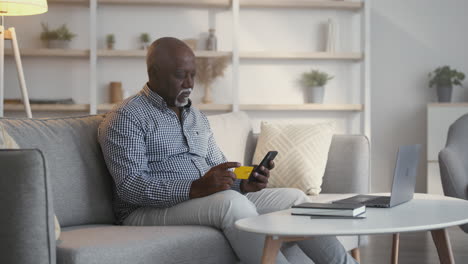 senior man making online payment