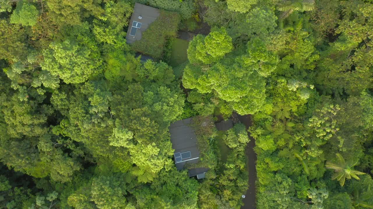 Sustainable jungle accommodation with solar power on roof in Central America, top down
