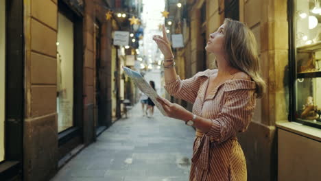 side view of focused woman looking map outdoor. tourist woman searching address