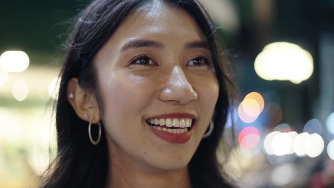 Smiling Woman at Night