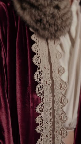 burgundy velvet robe with lace and fur collar