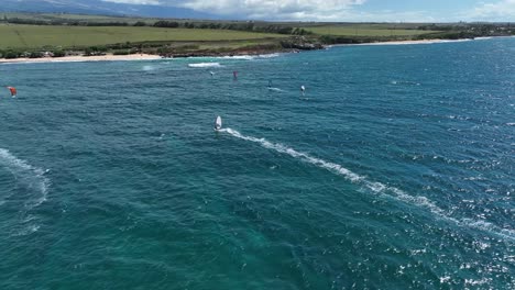 windsurfing paradise hawaii aerial pan across the calm