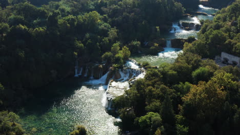 skradinski buk waterfall with glistening water on a sunny day in croatia