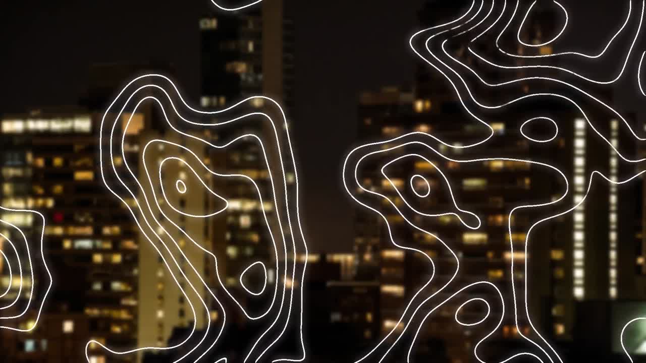 Animation of network of white lines over cityscape at night