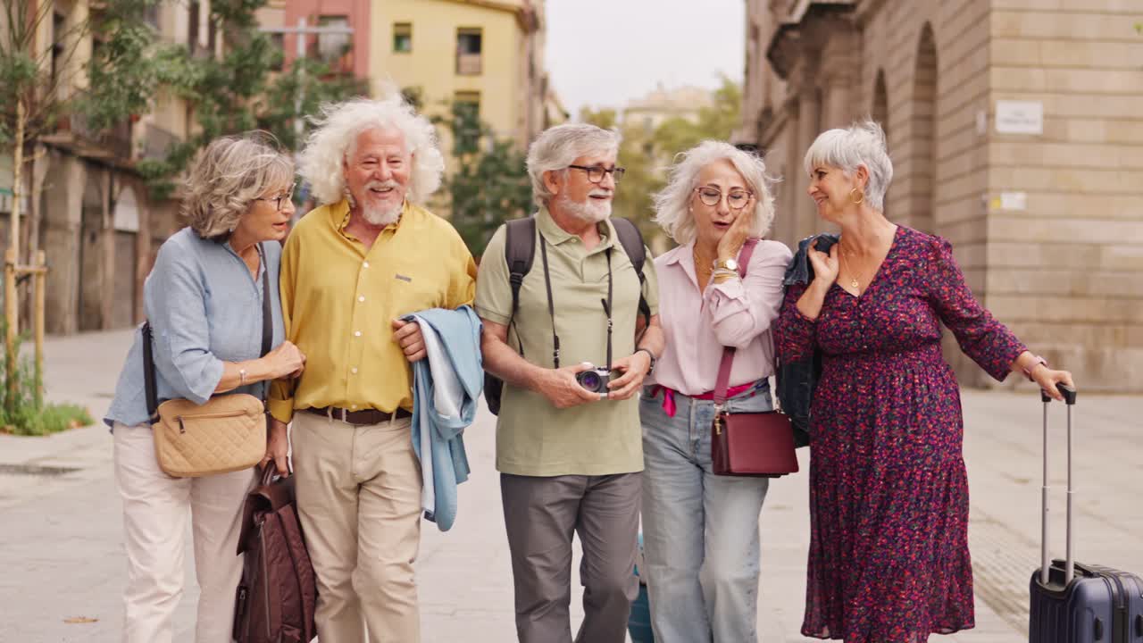 Group of senior tourists enjoying a city tour
