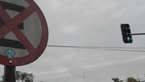 no stop sign with a traffic light on the background