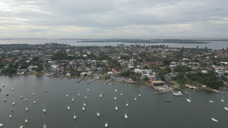 Aerial-view-of-Kogarah-Bay-at-San-Souci-Boats-Marina-and-Waterfront-Properties-featuring-yachts,-boats,-and-sailboats