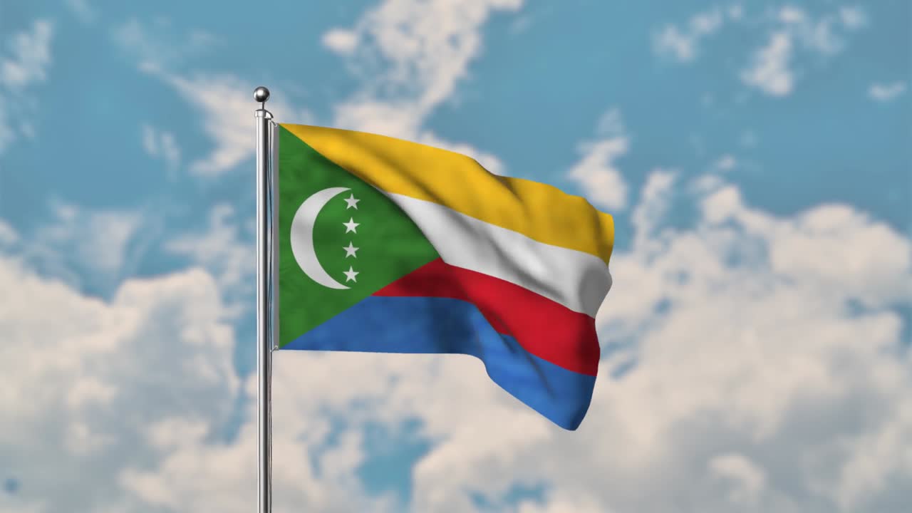 Comoros flag waving in the blue sky realistic 4k Video