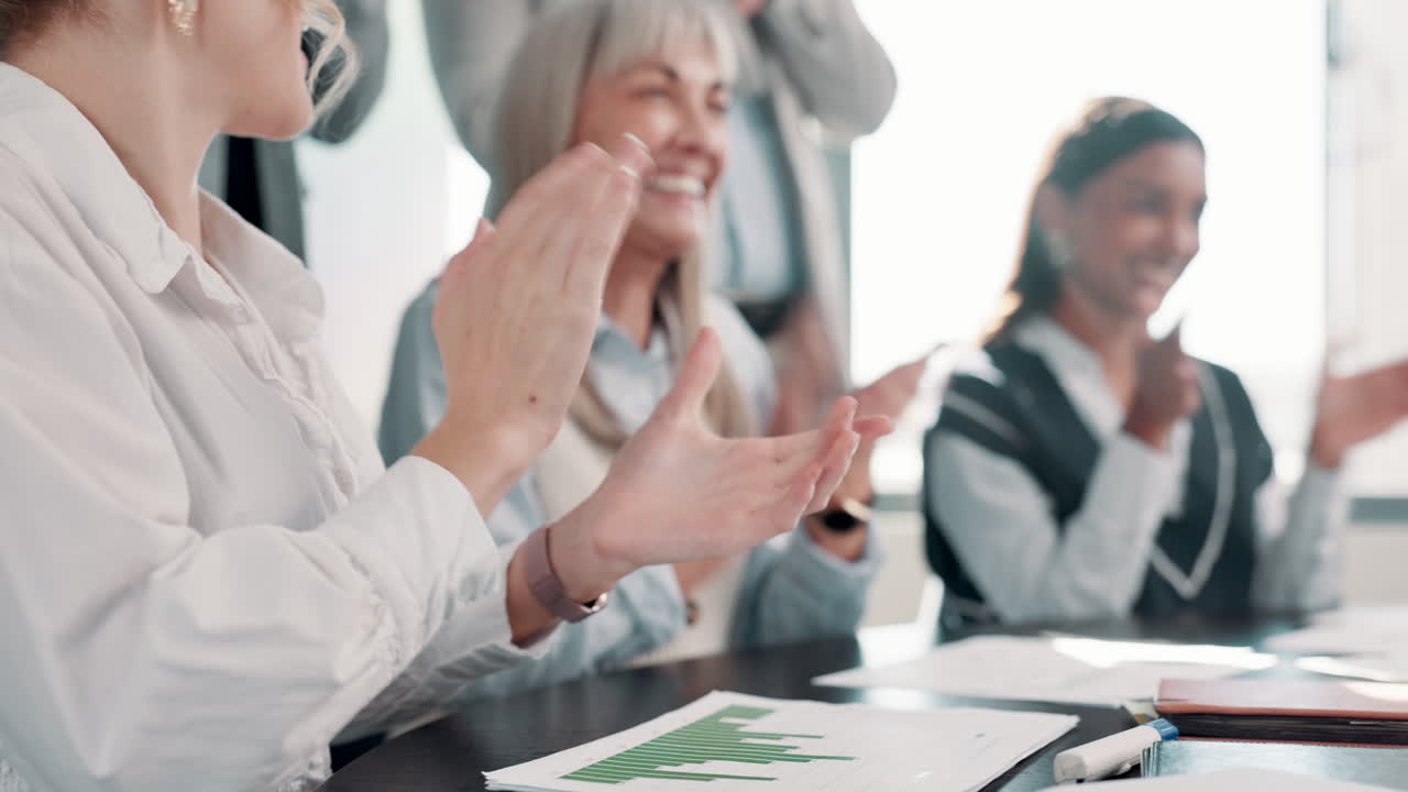 Business team celebrating success at meeting