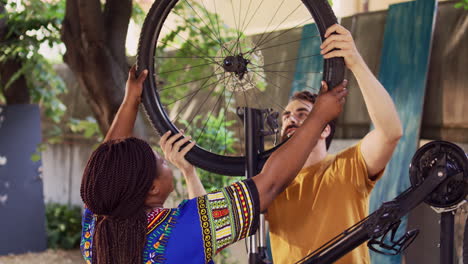 couple securing front bicycle wheel