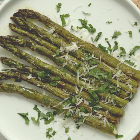 roasted asparagus with parmesan cheese and parsley  healthy spring food concept  view from above