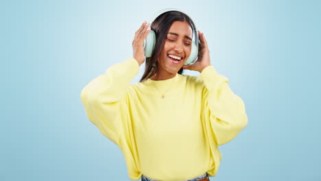 Singing,-headphones-or-Indian-woman-streaming