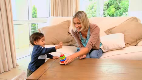 Little-boy-playing-with-mother